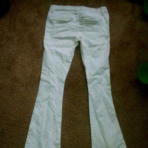 White bebe jeans bootcut distressed 27 EUC